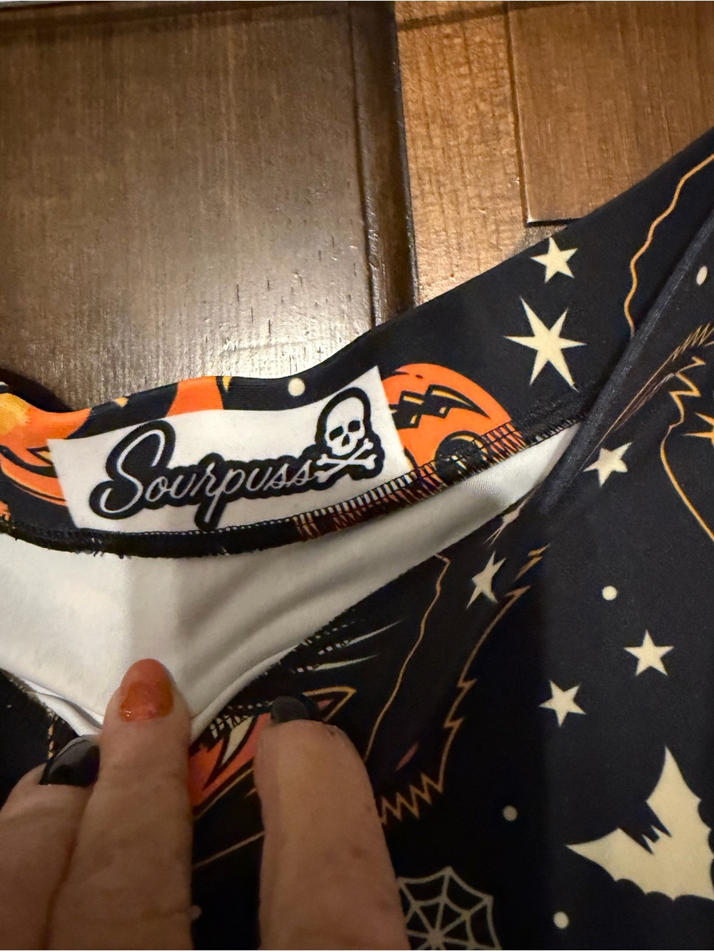 Sourpuss Black Swing Skirt with Orange Halloween Motifs - Picture 2 of 3